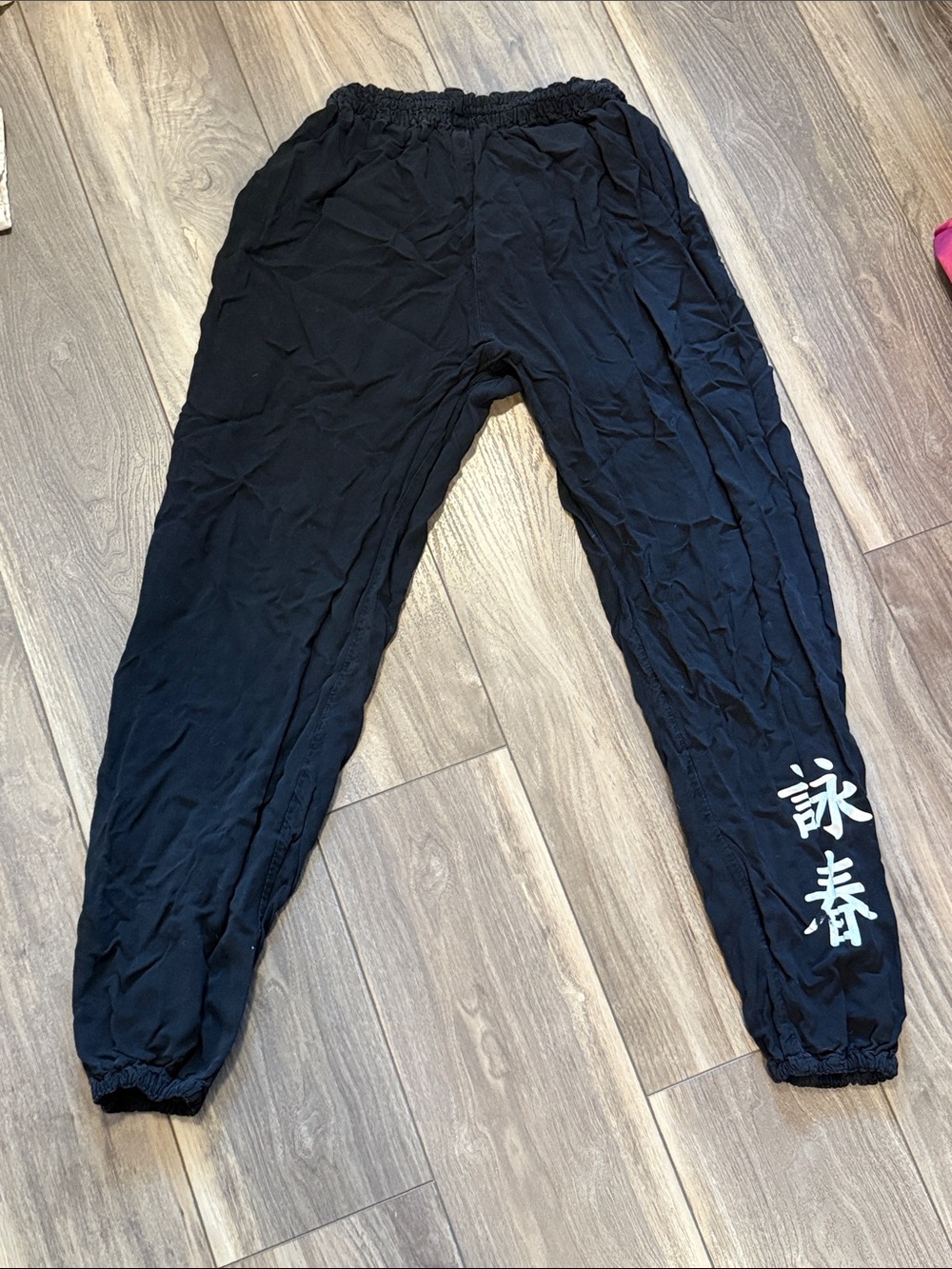 Black Women's Elastic-Waist Joggers with White Script Detail